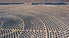 A 240-meter solar thermal tower surrounded by mirrors is operating as a symbol of the biggest energy revolution against climate change in Latin America. 