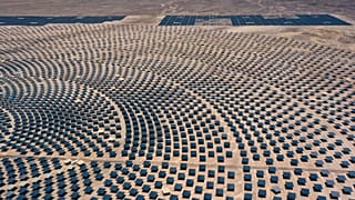 A 240-meter solar thermal tower surrounded by mirrors is operating as a symbol of the biggest energy revolution against climate change in Latin America. 