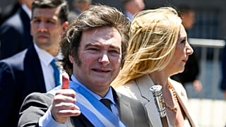 Argentina's newly sworn-in President Javier Milei arrives to the government house in Buenos Aires, 10 December 2023