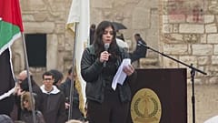 ماريالا الزغبي أثناء قراءة الرسالة لأطفال العالم