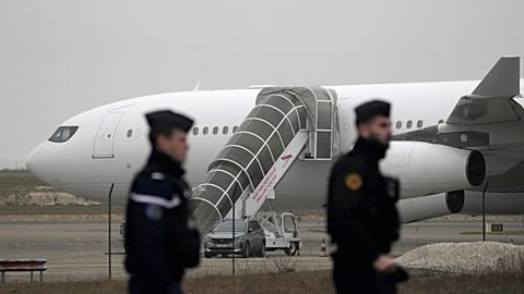 PhotoGendarmes patrol by the plane grounded by police based that it could be carrying trafficking victims, at the Vary airport