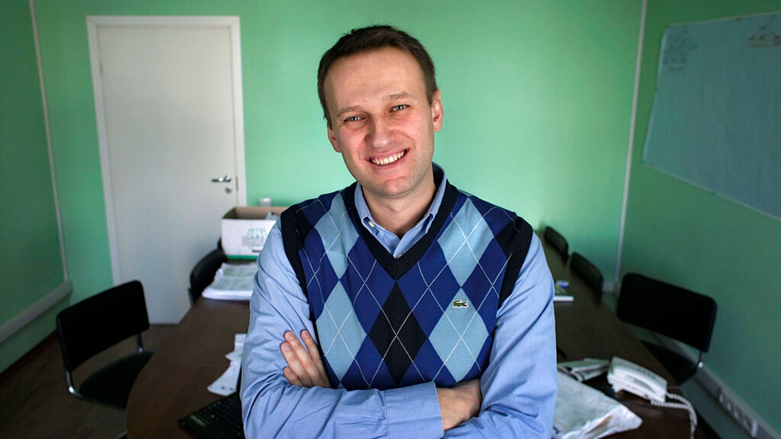 Corporate Russian lawyer Alexei Navalny poses in his office in Moscow, Russia. 