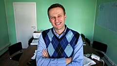 Corporate Russian lawyer Alexei Navalny poses in his office in Moscow, Russia. 