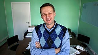Corporate Russian lawyer Alexei Navalny poses in his office in Moscow, Russia.