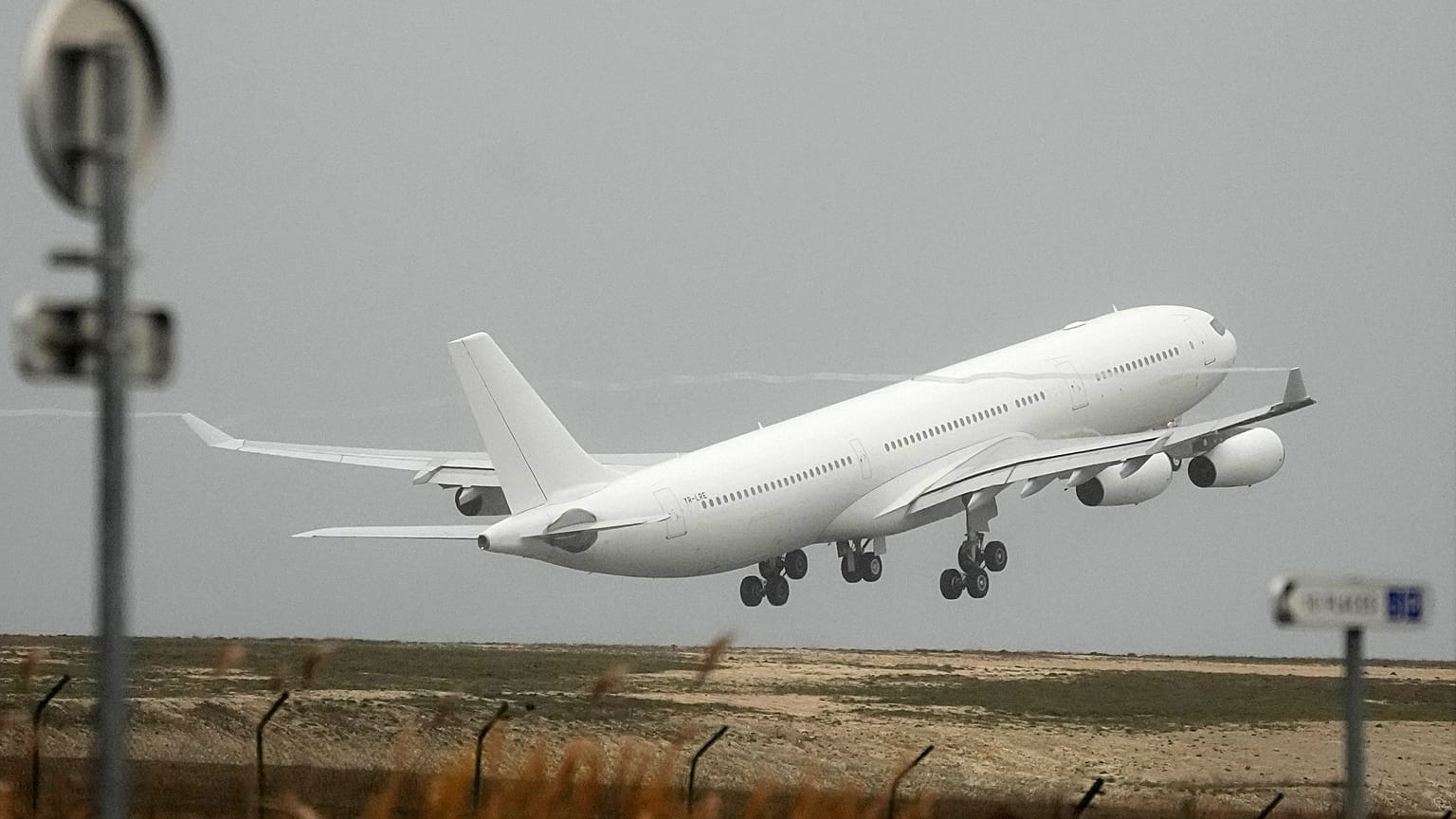 The plane grounded by police at the Vatry airport takes off Monday, Dec. 25, 2023 in Vatry, eastern France.