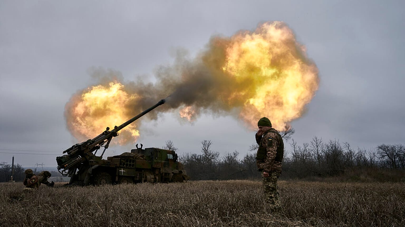 Ukrainian soldiers fire a French-made CAESAR self-propelled howitzer towards Russian positions near Avdiivka, Donetsk region, Ukraine, Monday, Dec. 26, 2022.