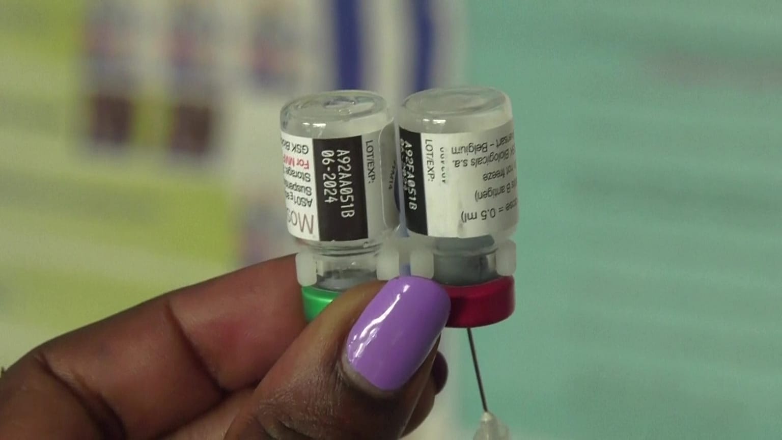 Nurse preparing a jab - RTS,S malaria vaccination
