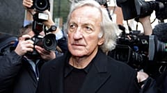 Journalist John Pilger, a supporter of Wikileaks founder Julian Assange arrives at the City of Westminster Magistrates Court in London in 2010