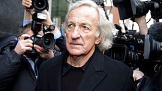 Journalist John Pilger, a supporter of Wikileaks founder Julian Assange arrives at the City of Westminster Magistrates Court in London in 2010