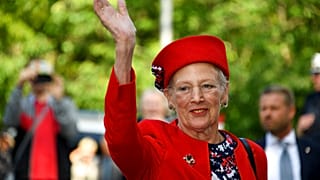 Denmark's Queen Margrethe II waves to visitors during her visit in Flensburg, northern Germany, Wednesday, Sept. 4, 2019.