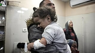 Palestinians wounded in the Israeli bombardment of the Gaza Strip receive treatment at the Nasser hospital in Khan Younis, Southern Gaza Strip, Sunday, Dec. 31, 2023.