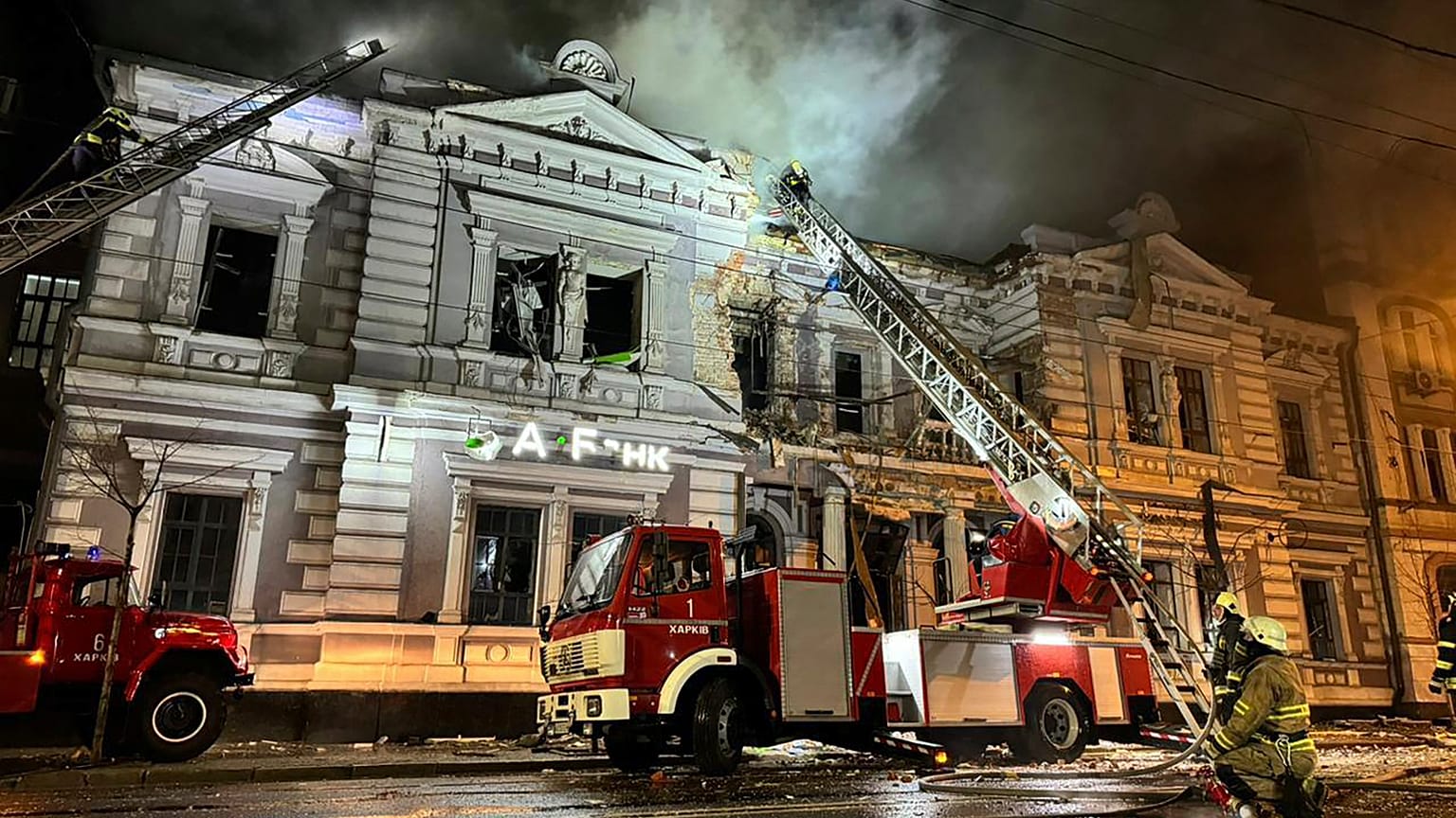 n this photo provided by the Ukrainian Emergency Service, firefighters put out a fire after a Russian missile attack in Kharkiv, Ukraine, Sunday, Dec. 31, 2023. 