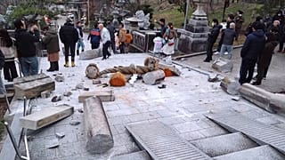 A torii gate is damaged after an earthquake at a shrine in Kanazawa, Ishikawa prefecture, Japan Monday, Jan. 1, 2024.