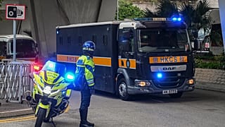 A prison van carrying activist publisher Jimmy Lai arrives at the West Kowloon Magistrates' Courts, where Lai's trial takes place, in Hong Kong, Tuesday, Jan. 2, 2024