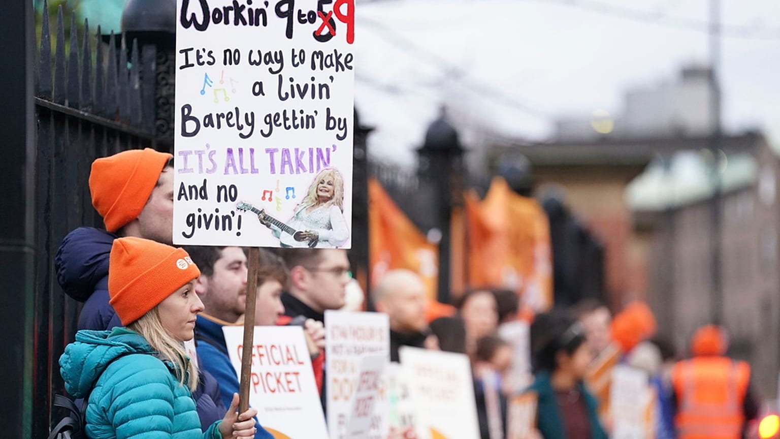Junior doctors and members of the British Medical Association (BMA) demonstrate outside Royal Victoria Infirmary, Newcastle, England on Wednesday
