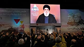 Hezbollah leader Sayyed Hassan Nasrallah speaks via a video link during a ceremony in Beirut, Lebanon, Wednesday, Jan. 3, 2024.