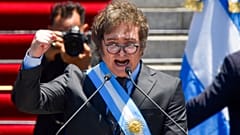 FILE- Argentina's newly sworn-in President Javier Milei speaks outside the Congress in Buenos Aires, Argentina, Dec. 10, 2023. 