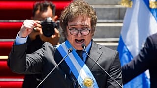 FILE- Argentina's newly sworn-in President Javier Milei speaks outside the Congress in Buenos Aires, Argentina, Dec. 10, 2023. 