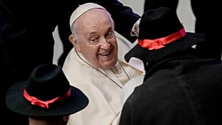 Pope Francis greets people during his weekly general audience in the Pope Paul VI hall at the Vatican, Wednesday, Jan. 3, 2024.