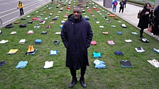 Idris Elba stands in Parliament Square with clothing representing the human cost of UK Knife Crime in London, Monday, Jan. 8, 2024. 