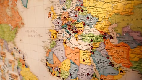 Lexie Alford has marked the countries visited on a map in her home office in Nevada City, Ca. on Tues. April. 16, 2019. 