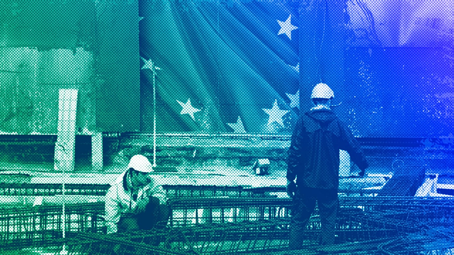 Construction workers work on a new entrance at EU headquarters in Brussels, October 2019
