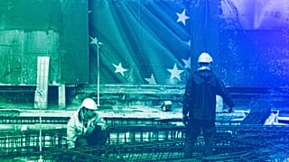 Construction workers work on a new entrance at EU headquarters in Brussels, October 2019