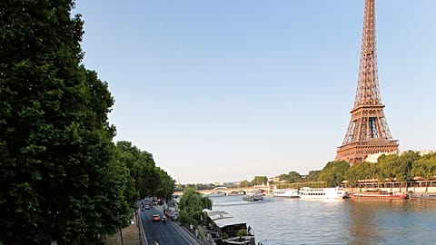 In this July 21, 2013 file photo shows the road along the Seine river, with the Eiffel Tower at right, in Paris. 