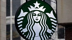 The Starbucks logo is seen, March 14, 2017, on a shop in downtown Pittsburgh.