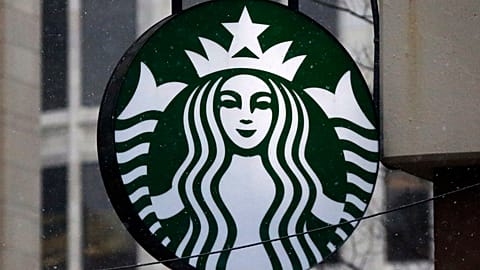 The Starbucks logo is seen, March 14, 2017, on a shop in downtown Pittsburgh.