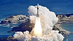 An H2A rocket is lifted from the launch pad at Tanegashima Space Centre in Kagoshima, southern Japan.