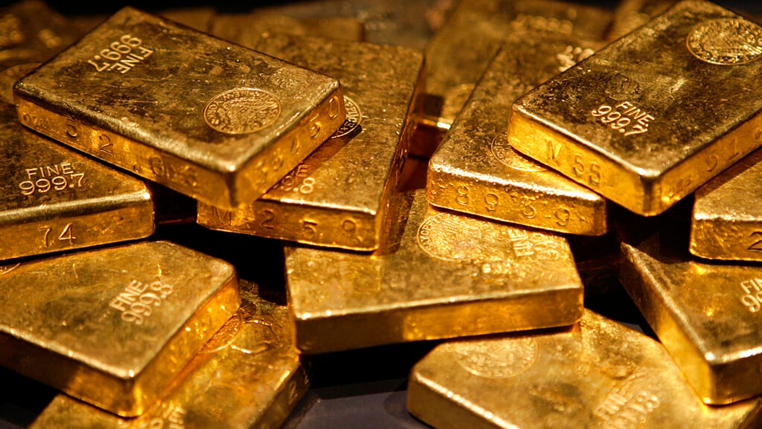 FILE - In this file photo taken Nov. 8, 2006, gold bars are on display at the "Gold" exhibit in the American Museum of Natural History in New York. 