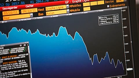 A screen displaying the activity of the CAC, the French Stock index, is seen in a business bank, in Paris, Thursday, Sept. 22, 2011. 