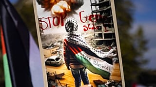 Protesters hold Palestinian flags and placards reading "Free Palestine" and "Stop genocide" during a rally supporting the Palestinian people, in Zurich, Switzerland, Saturday,