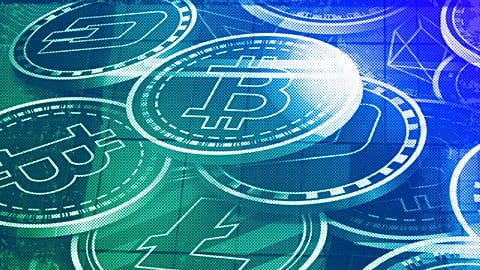 An advertisement of Bitcoin is displayed on a building in Hong Kong, November 2021