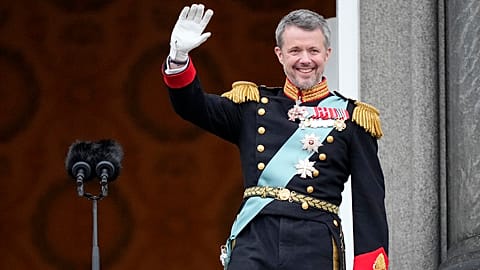 Denmark's new King Frederik X waves from the balcony of Christiansborg Palace in Copenhagen, Denmark on Sunday