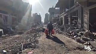 Лагерь беженцев Бурейдж на севере сектора Газа после израильской операции