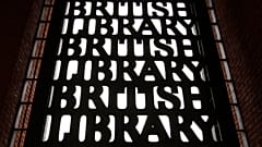 British Library signs are seen over an entrance to the library in London. 