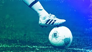 A player touches the ball during the women's group F soccer match between Japan and South Africa in Cardiff, July 2012