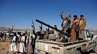 Houthi fighters and tribesmen stage a rally against the U.S. and the U.K. strikes on Houthi-run military sites near Sanaa, Yemen, on Sunday, Jan. 14, 2024. 