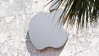 The Apple logo is displayed over one of their stores in the US.