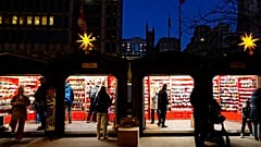 Shoppers visit the Christmas Village in Philadelphia, Dec. 13, 2023. 