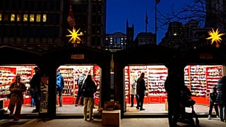 Shoppers visit the Christmas Village in Philadelphia, Dec. 13, 2023. 