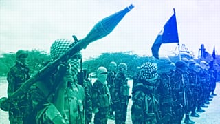 Al-Shabaab fighters display weapons as they conduct military exercises in northern Mogadishu, Somalia, October 2010