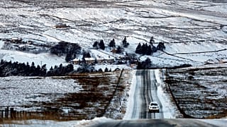 A snow-covered hillside is photographed at Nenthead in Cumbria, England