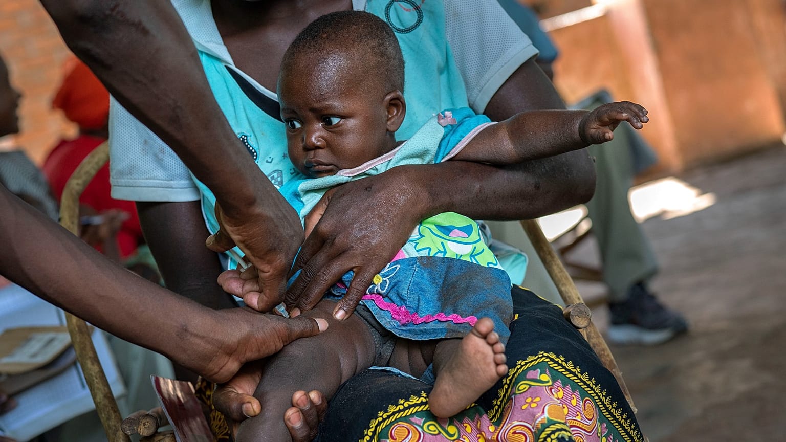 A baby from the Malawi village of Tomali is injected with the world's first vaccine against malaria in a pilot programme, in December 2019.