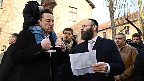 Tesla and SpaceX's CEO Elon Musk visits the site of the Auschwitz-Birkenau Nazi German death camp in Oswiecim, Poland, on Monday, Jan. 22, 2024. 