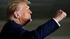 Republican presidential candidate former President Donald Trump gestures as he arrives at a campaign event in Laconia, N.H., Monday, Jan. 22, 2024. 