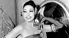 Josephine Baker poses in her dressing room at the Strand Theater in New York City, USA in 1961