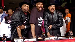 From the left, Jason 'Jam Master Jay' Mizell, poses with Darryl "DMC" McDaniels and Joseph "DJ Run" Simmons as they are inducted into Hollywood's RockWalk.